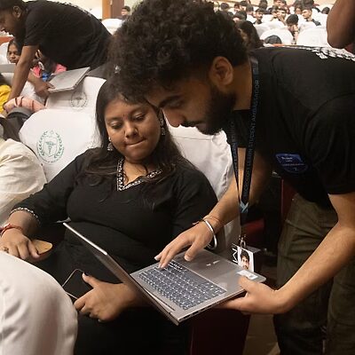 Arpit guiding students through hands-on AI exercise